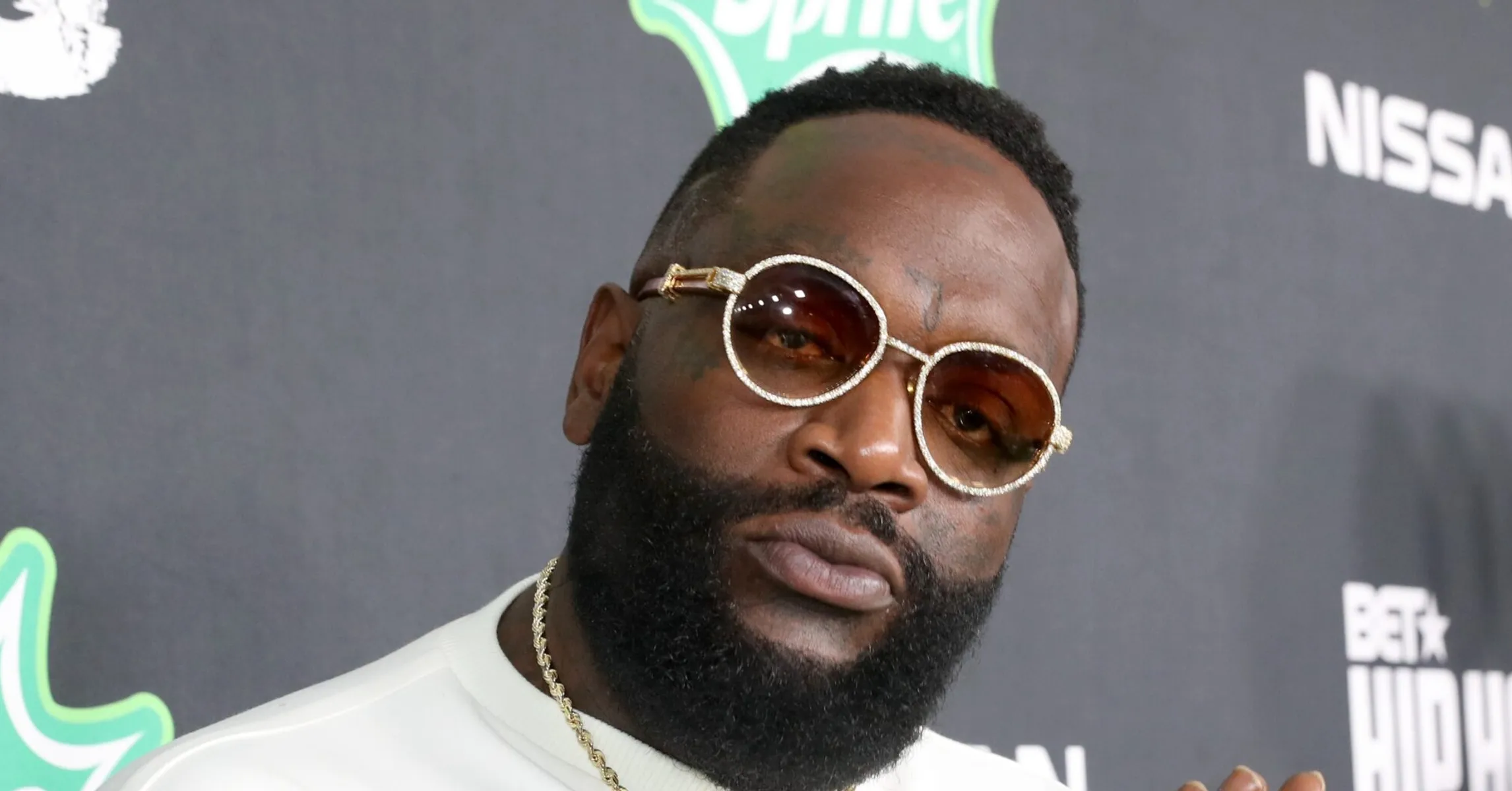 Rick Ross & His New Girlfriend Paige Imani's PDA Leaves Fans Split