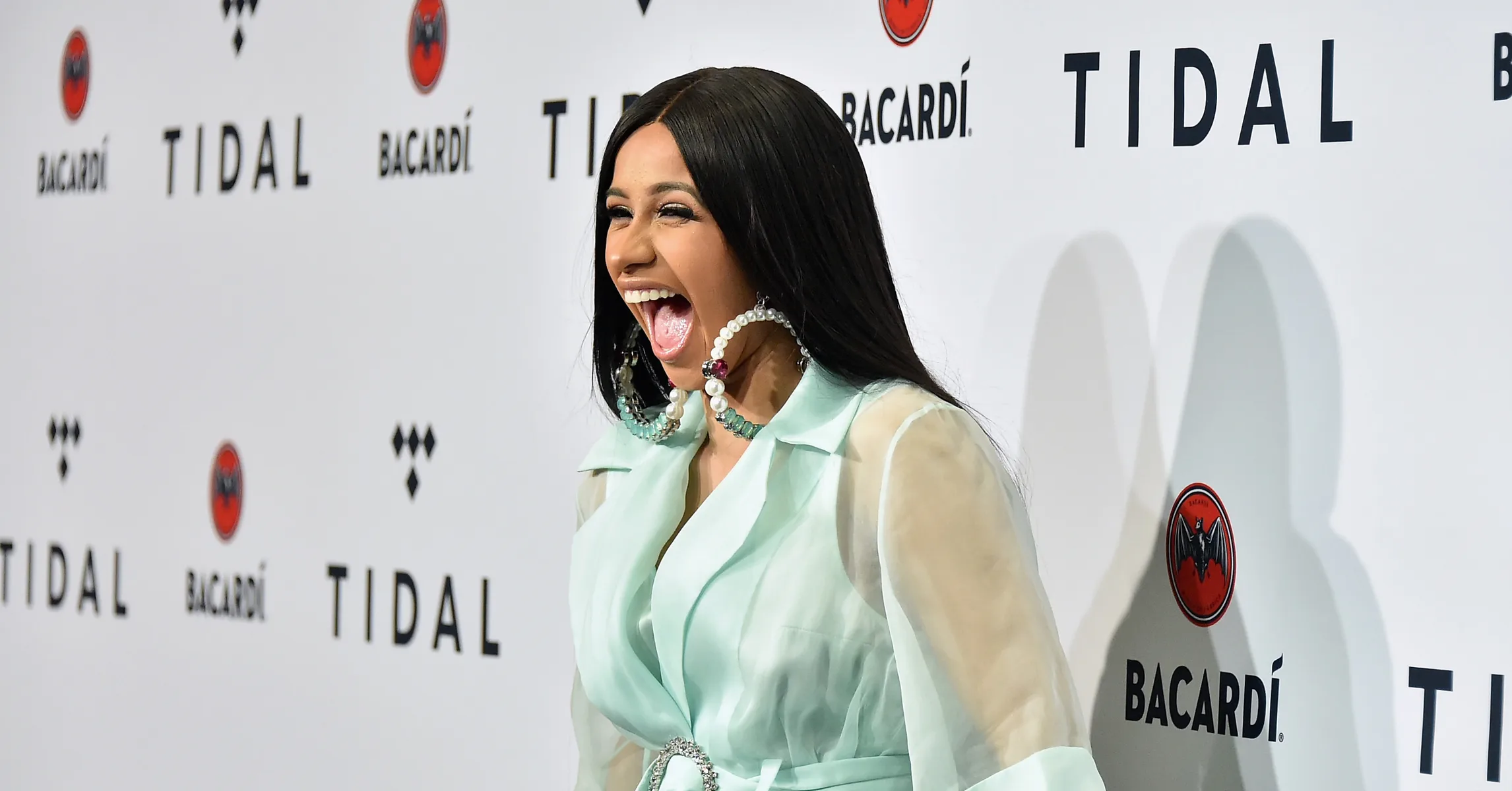 Cardi B Shares Throwback Photo As A 7-Year-Old With Crooked Teeth