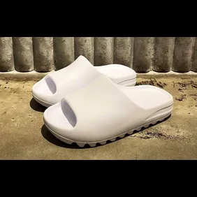 Yeezy white slides hot sale