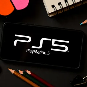 In this photo illustration a PlayStation 5 logo seen
