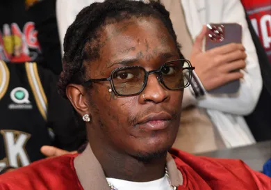 Rapper Young Thug attends the game between the Phoenix Suns and the Atlanta Hawks at State Farm Arena.