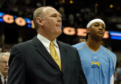 DENVER,CO--MARCH 16TH 2005--Denver Nugget Head Coach George Karl and Nugget star Carmelo Anthony wait for introductions before the game against the Charlotte Bobcats at Pepsi Center. THE DENVER POST/ ANDY CROSS