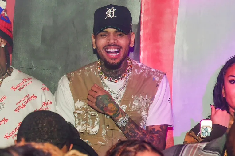 Chris Brown Proposes To A Fan During Meet & Greet