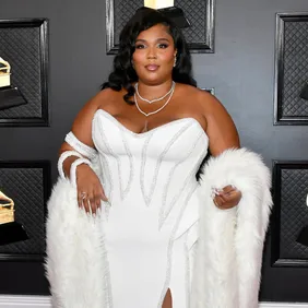Lizzo Teases The Song Of The Summer While Boarding A Plane In Assless  Leggings
